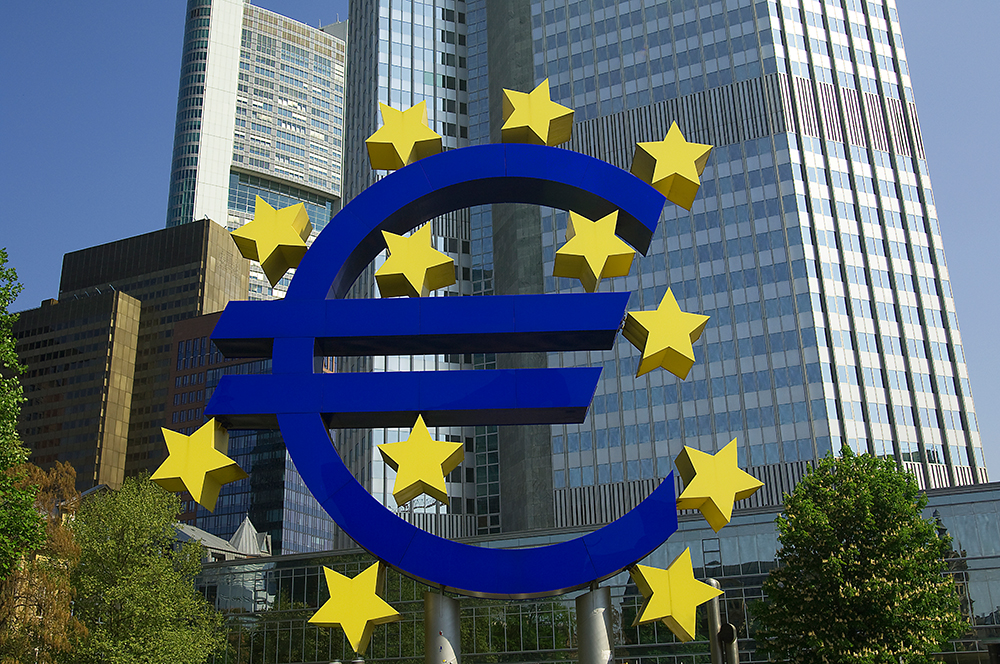 Investor greed putting financial stability at risk, warns ECB / Euro Sculpture -And ECB Headquarter / The Telegraph